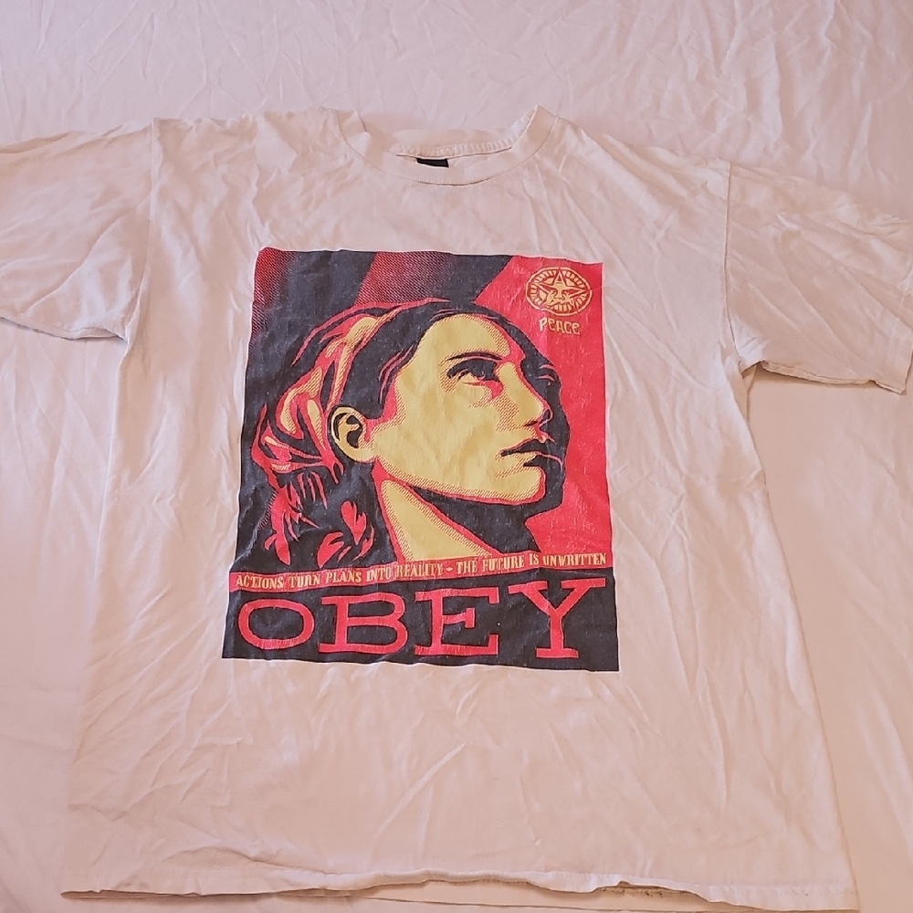 Vintage Obey Cream Tee With Red and Black Graphic